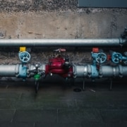 Industrial pipes and valves being connected during modular RTO commissioning