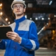 Engineer inspecting a regenerative thermal oxidizer control panel during troubleshooting